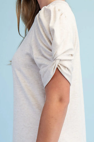Cream Knit Round Neck Midi Dress with a Sleeve Twist Detail and Side Slits Final Sale