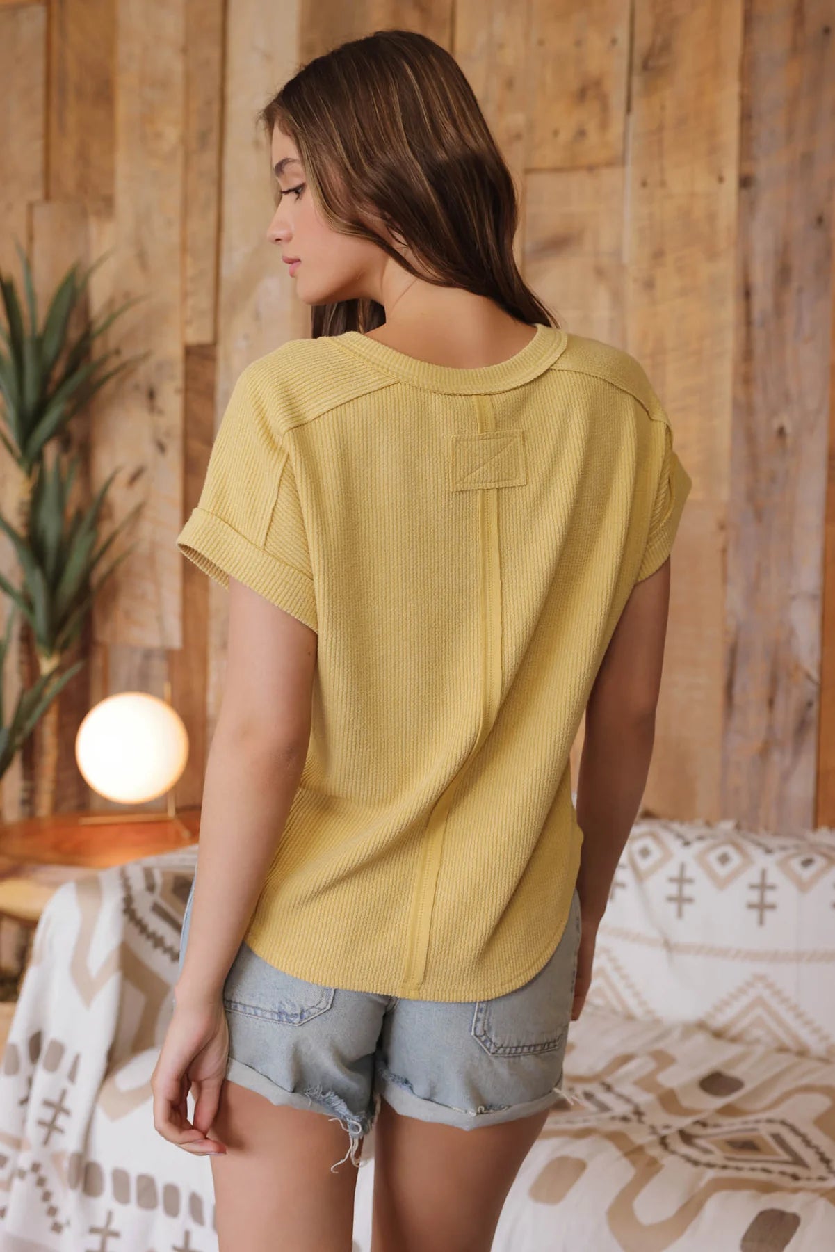 DUSTY YELLOW RAW EDGE V NECK EXTENDED SHORT SLEEVE KNIT TOP