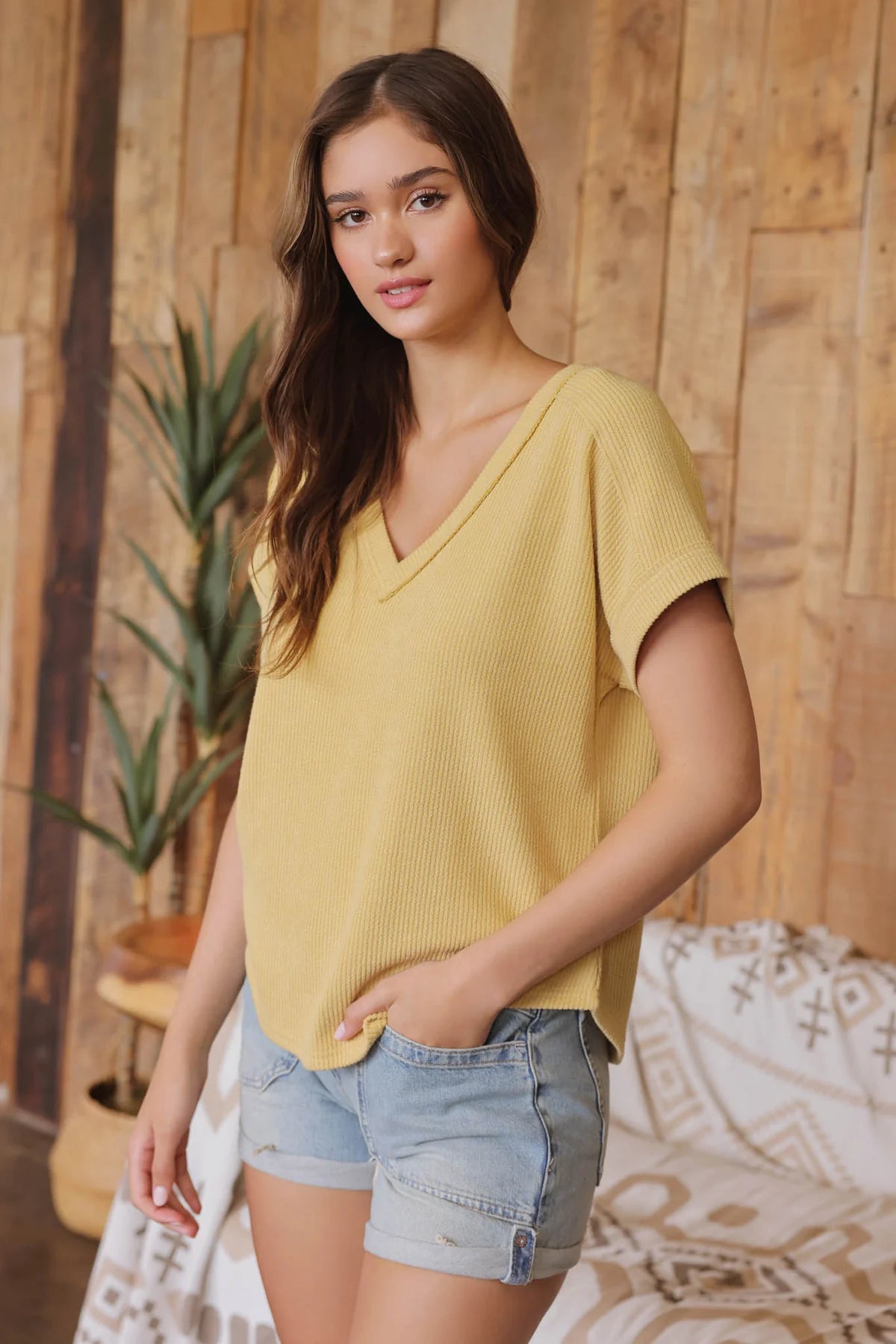 DUSTY YELLOW RAW EDGE V NECK EXTENDED SHORT SLEEVE KNIT TOP