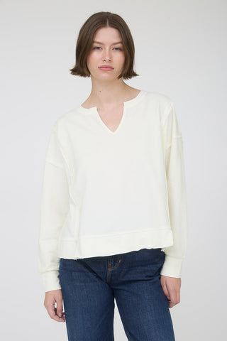 SC IVORY WASHED EXPOSED SEAM LONG SLEEVE KNIT TOP