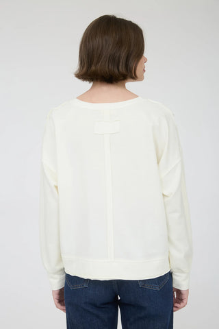 SC IVORY WASHED EXPOSED SEAM LONG SLEEVE KNIT TOP