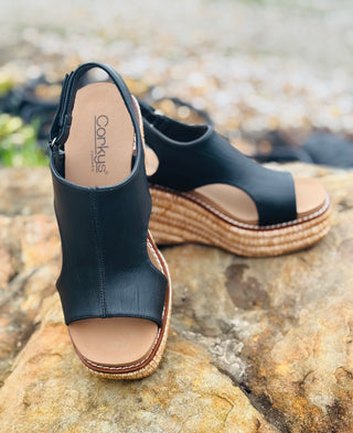 Corkys "Freddie" Wedge Sandal in Black Smooth