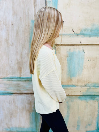 SC BUTTER YELLOW RIBBED HENLEY LONG SLEEVE EXPOSED SEAM KNIT TOP