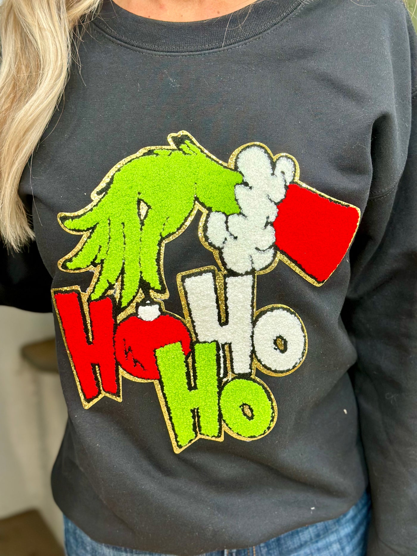 Ho Ho Ho Grinch Chenille Sweatshirt on Black