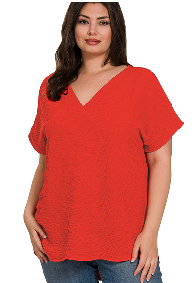 CURVY TOMATO WOVEN AIRFLOW V-NECK HI-LOW HEM TOP