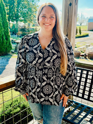 Black Printed V-Neck Blouse with a Zipper Front and Smocked Waist