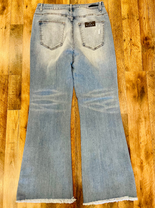 Risen Curvy Light Wash High rise vintage frayed hem flare jeans