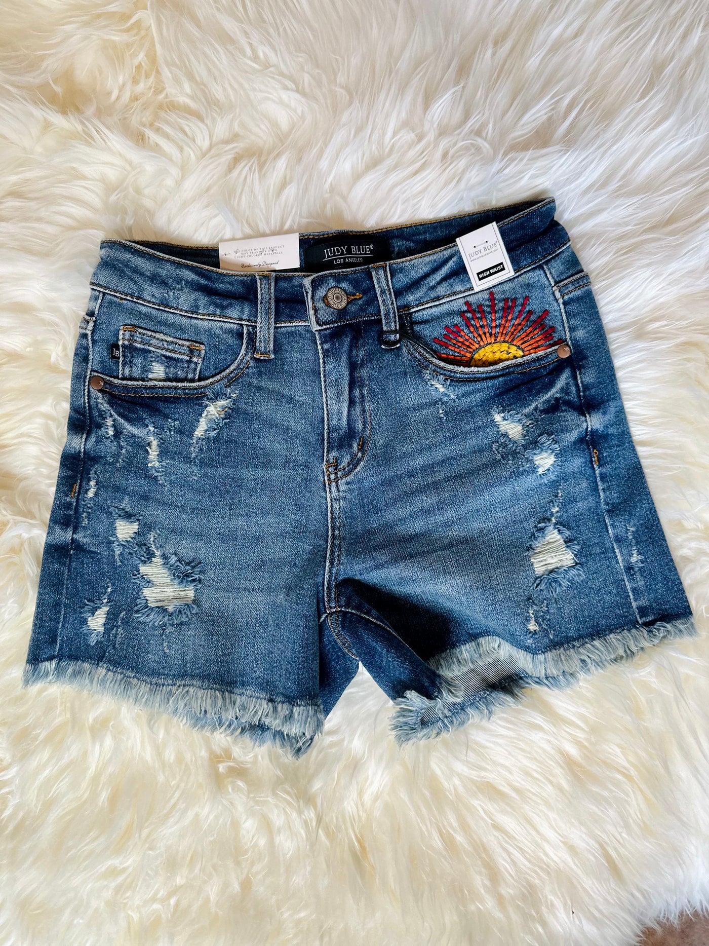 JUDY BLUE MEDIUM WASH HI-RISE SUN EMBROIDERY CUT OFF SHORTS